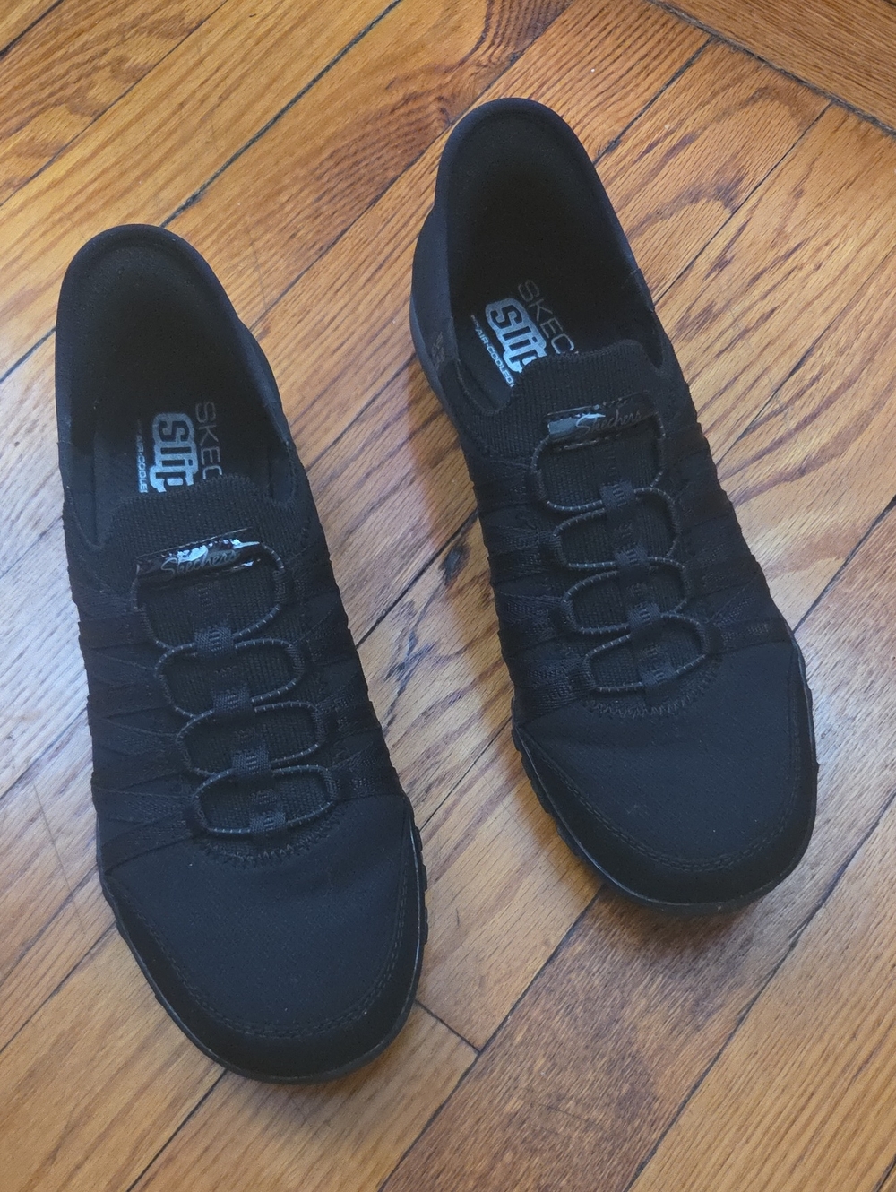 Skechers Women Black Slip-On Sneakers